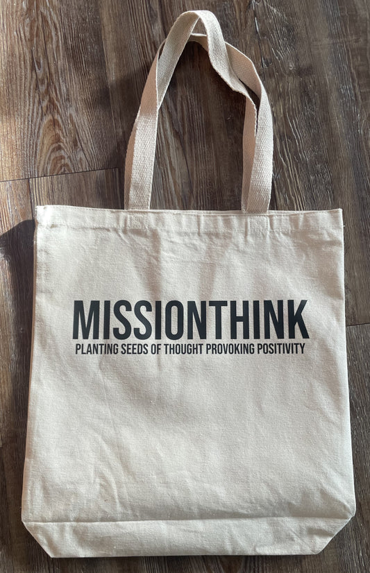 Mission Think Tote Bag shown from the front. Reading "Mission Think Planting Seeds of Thought Provoking Positivity"